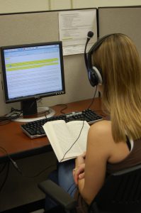 Photo: Student using e-text for reading