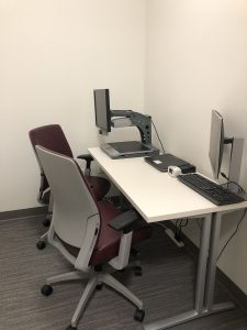 Individual testing room with video magnifier, computer and monitor