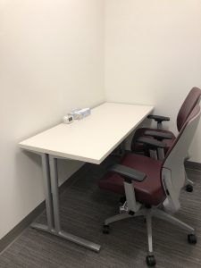 Individual testing room with table and 2 chairs